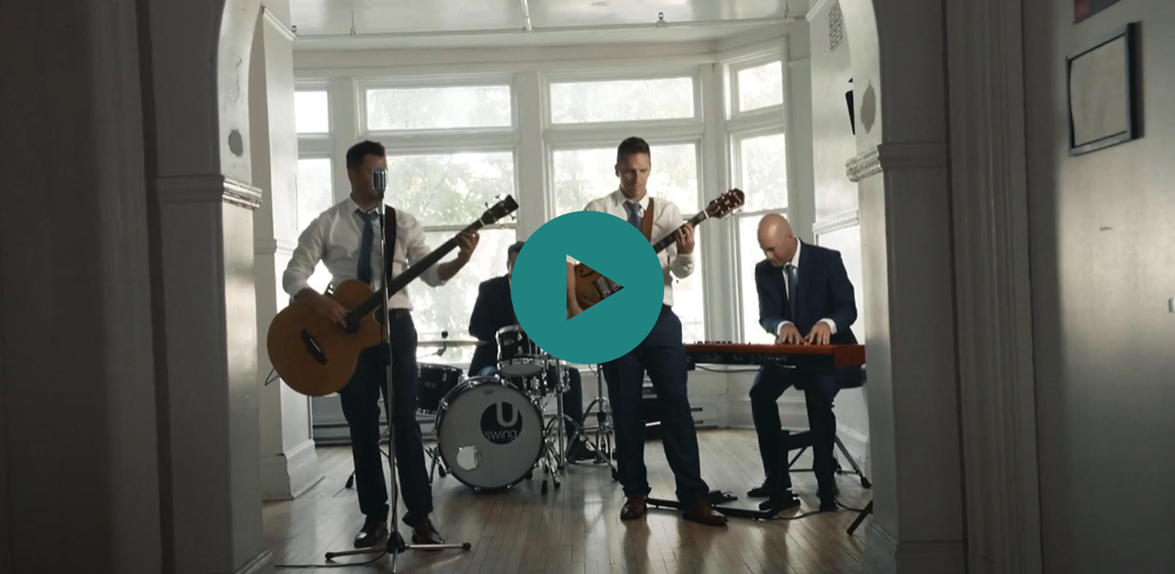 A group of men playing instruments in a room.