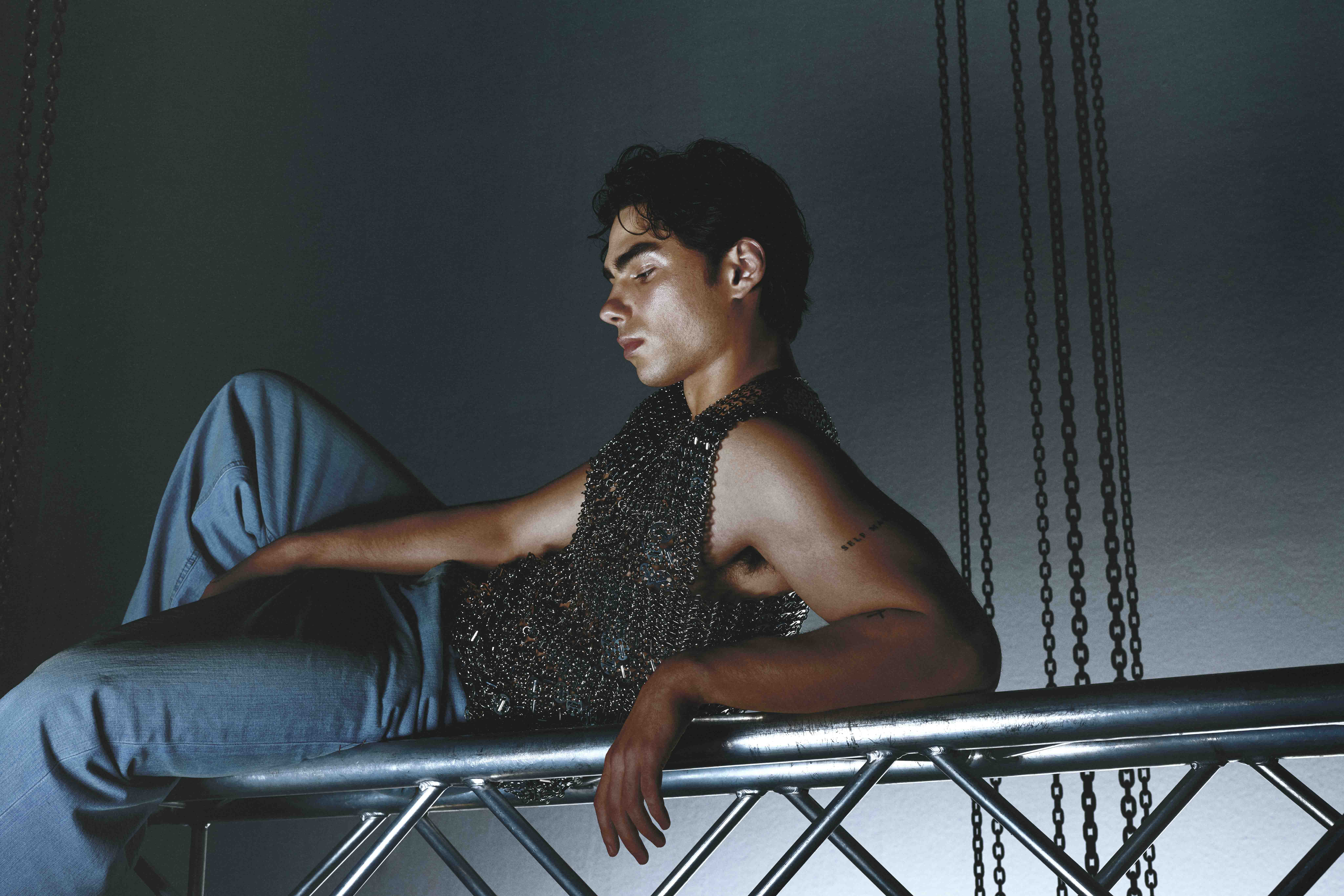 Artfully staged fashion image styled by Bianca Fleisch x Paco Rabanne showing the one million fragrance