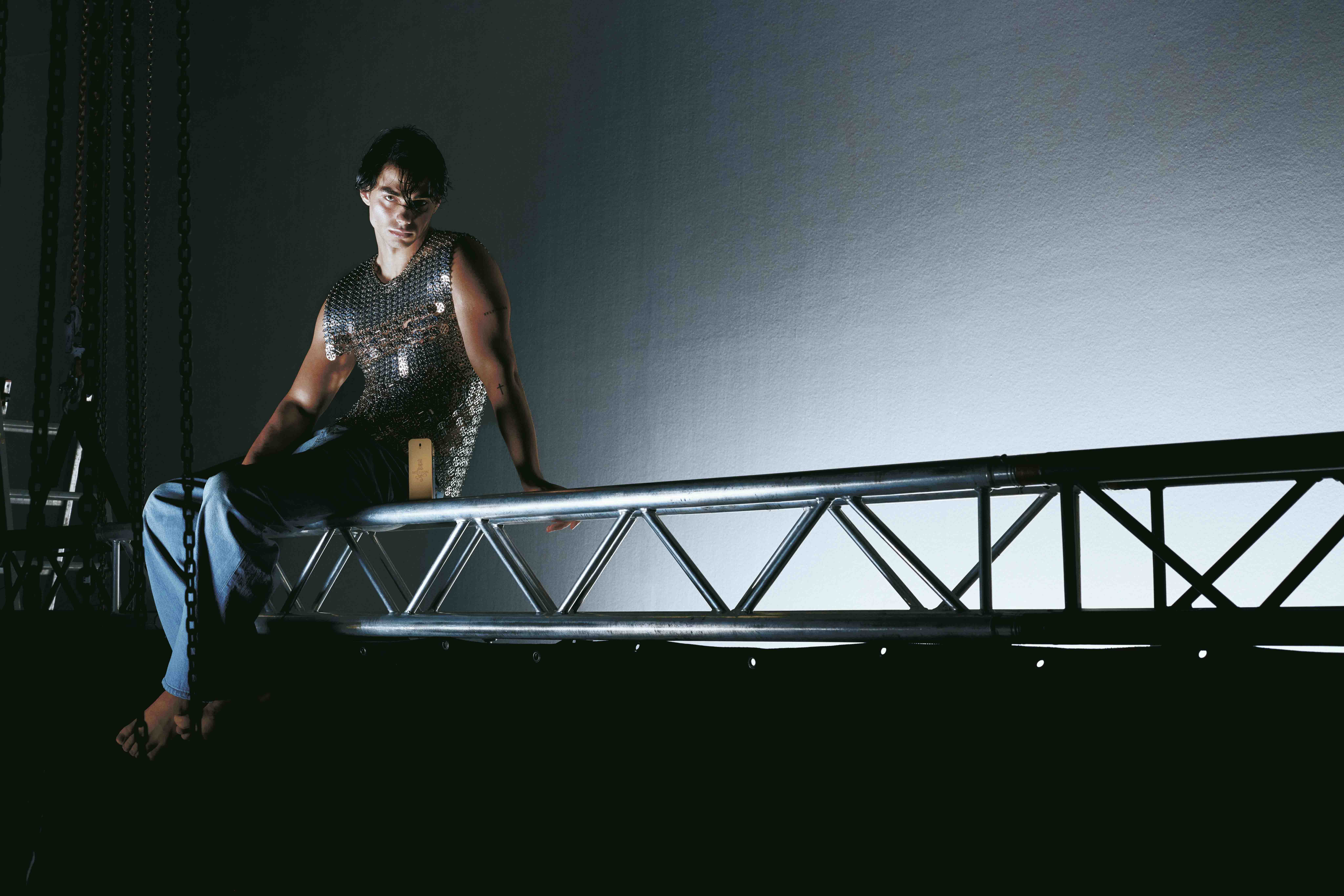 Artfully staged fashion image styled by Bianca Fleisch x Paco Rabanne showing the one million fragrance