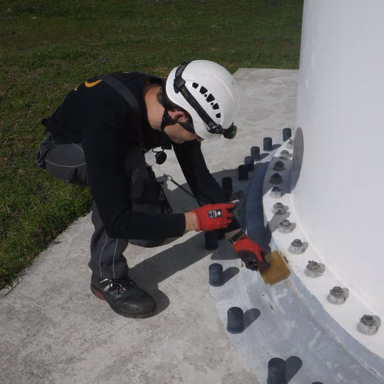 8.2 employee picturing a damage on tower socket of turbine