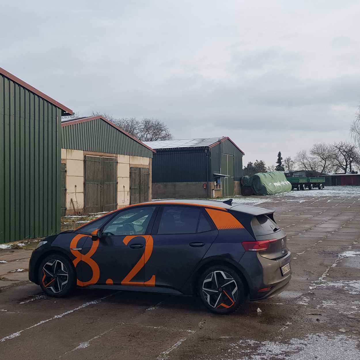 8.2 labeled car in front of storage with PV.jpg