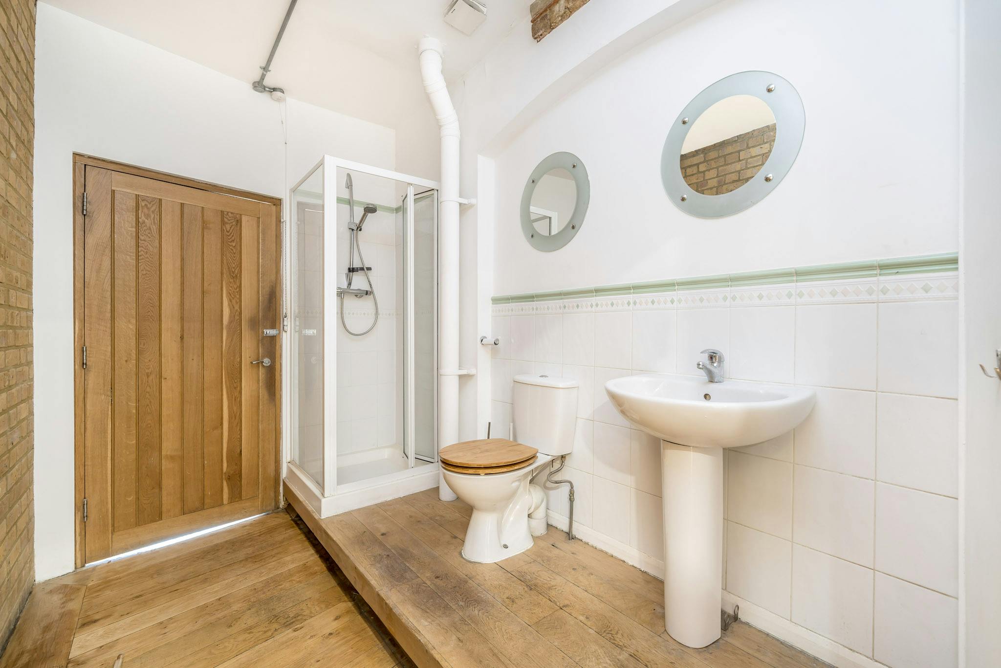 332802-1 Playhouse Court 64 SBR Live work WC Shower.jpg