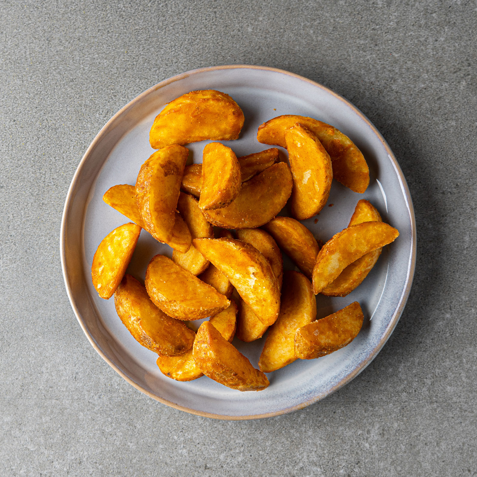 Seasoned battered jacked potato wedges