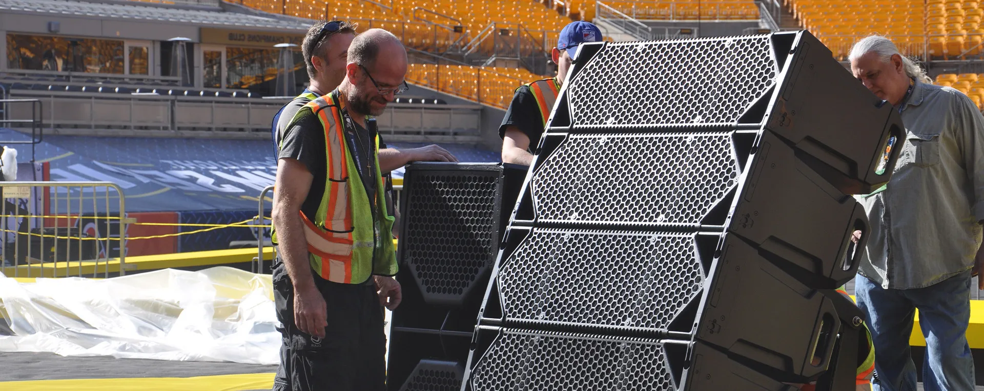 People around a Cohesion CO-12 speaker