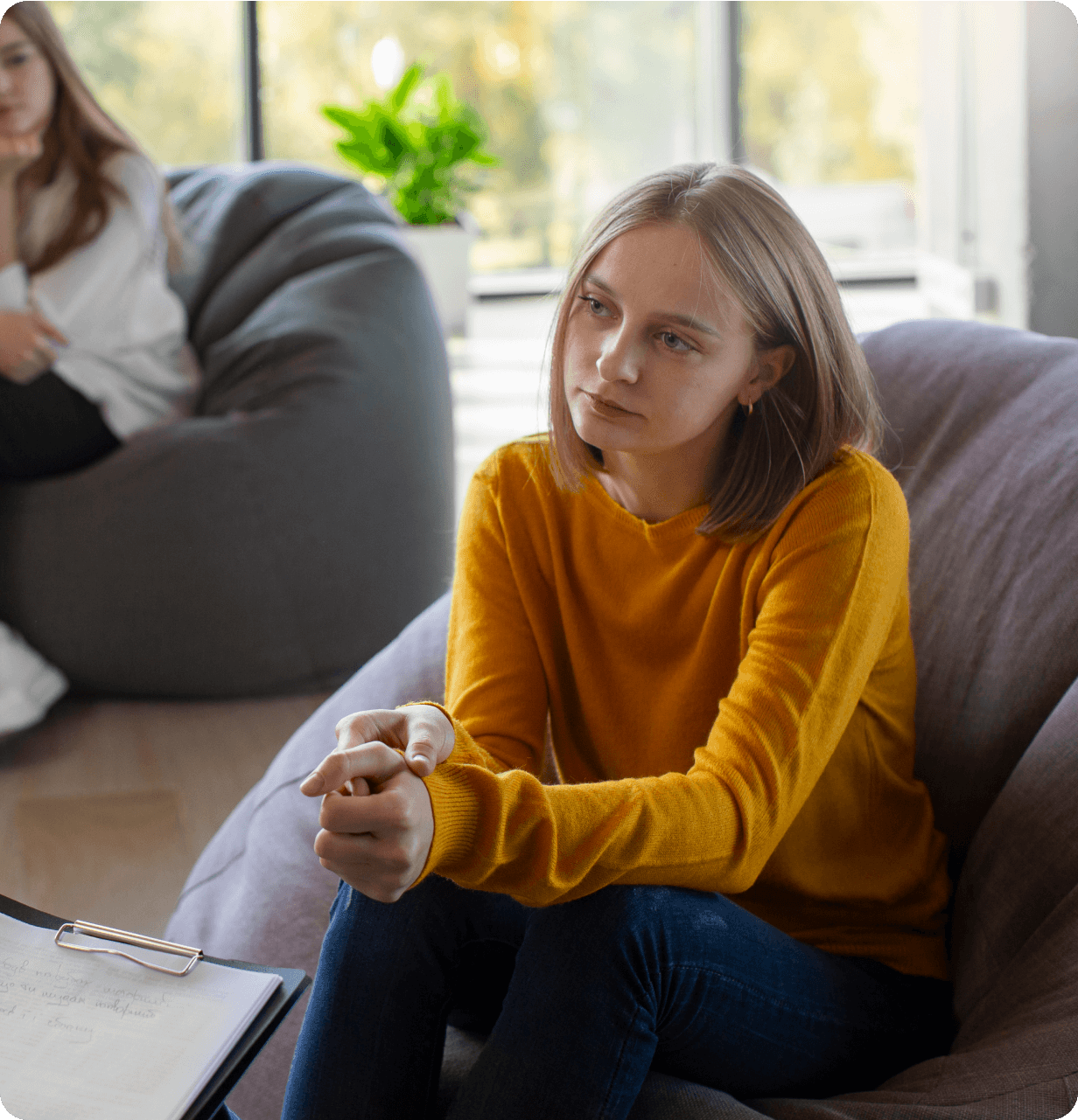 Teen sitting on a couch