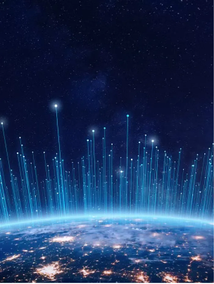 Night view of Earth with glowing network lines extending into space.