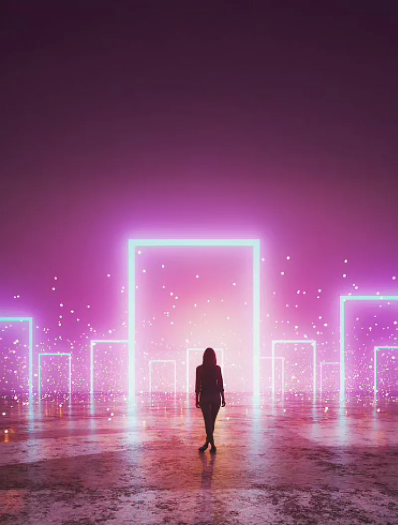 Silhouette of a woman standing in a glowing purple digital landscape.