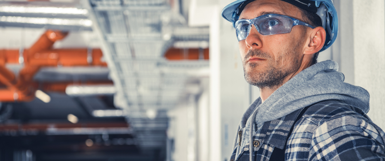 HVAC operator studies the plan before the day kicks off, ensuring the work runs with intent, not just muscle.