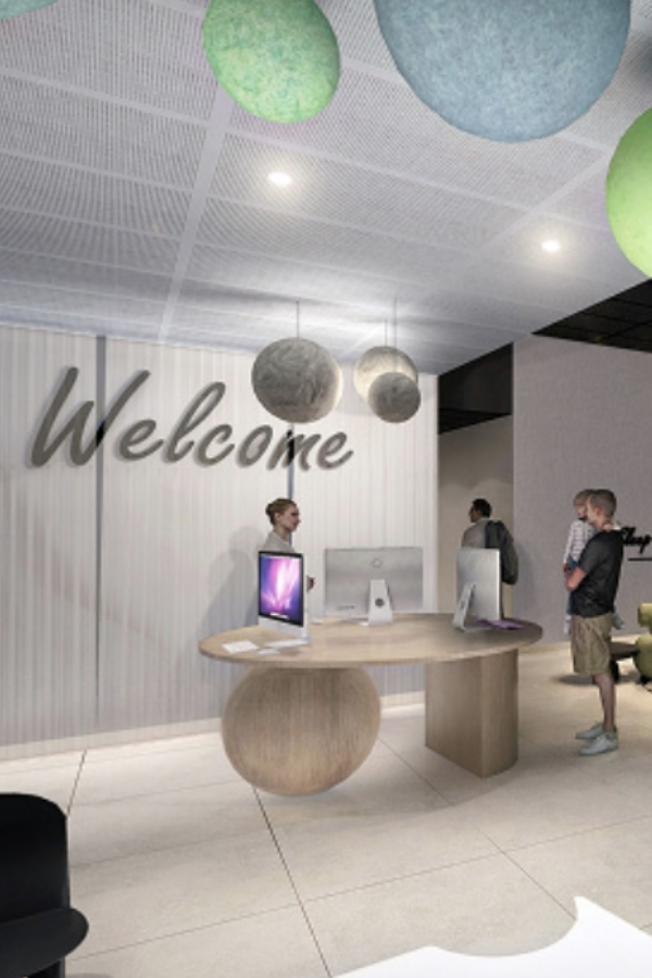 Réception design et lumineuse de l’hôtel YSOTOP à Grenoble, pensée pour un accueil fluide et élégant des voyageurs.