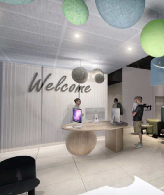 Accueil de l’hôtel YSOTOP à Grenoble, un espace chaleureux et moderne pour recevoir les voyageurs professionnels et loisirs dès leur arrivée.