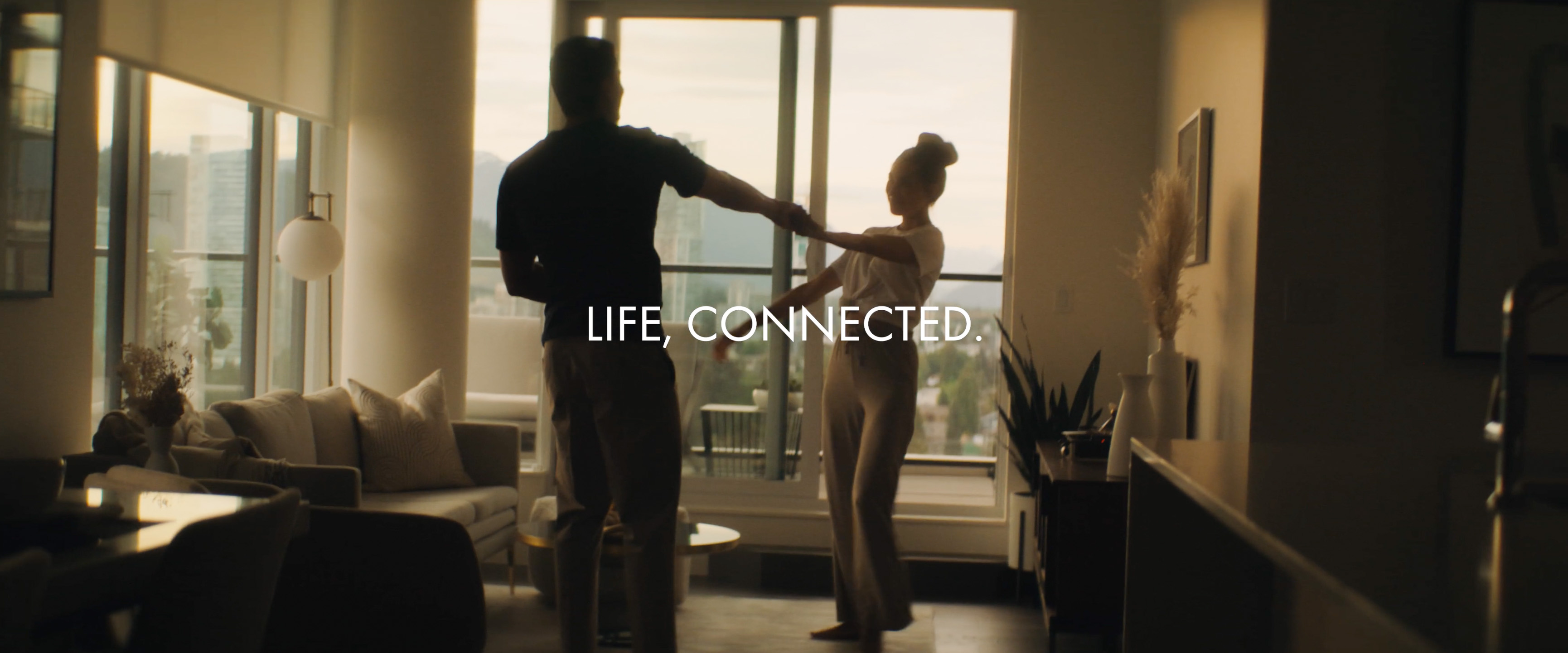 Cinematic dusk interior frame from a NoraVera lifestyle commercial