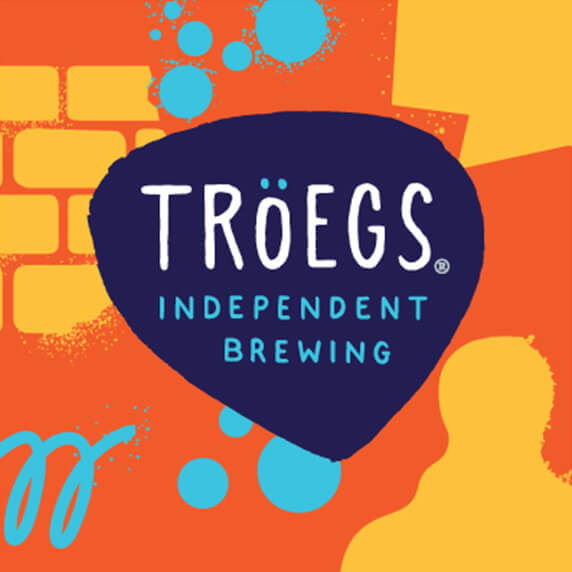 Tröegs logo with Graffiti Highway spray paint texture.