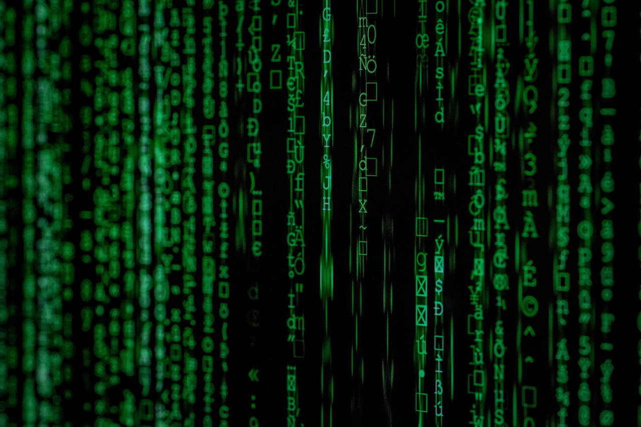 Green matrix-style digital code cascading on dark background