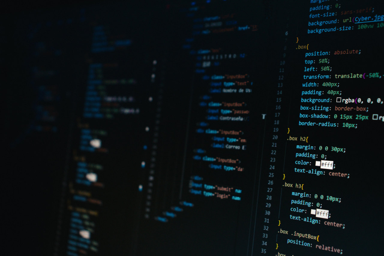 Dark screen showing CSS code with blue and yellow syntax highlighting