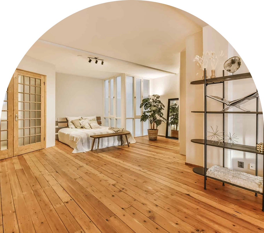 Light chestnut hardwood floor in open bedroom