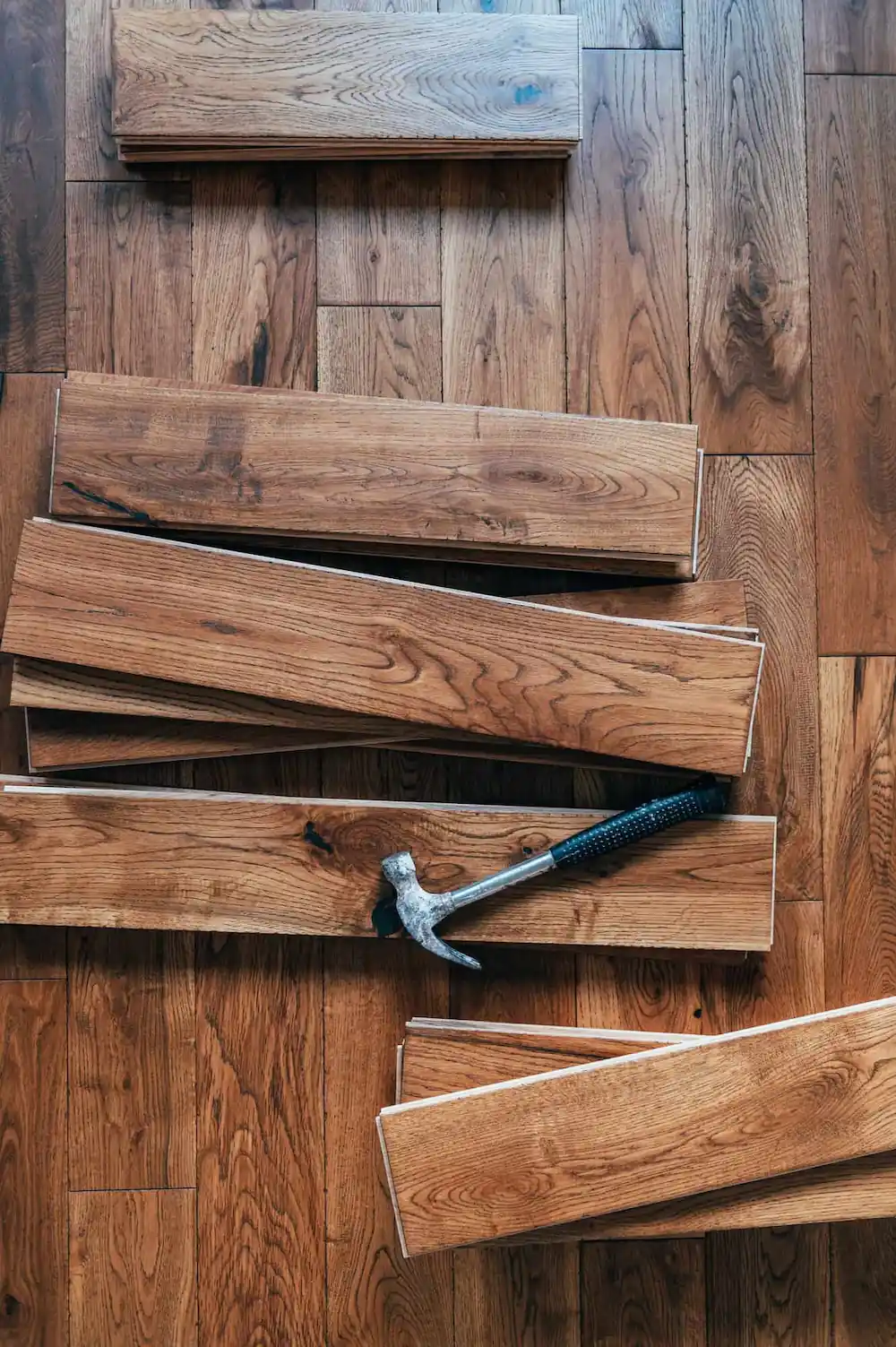 solid oak flooring and pile of hardwood planks