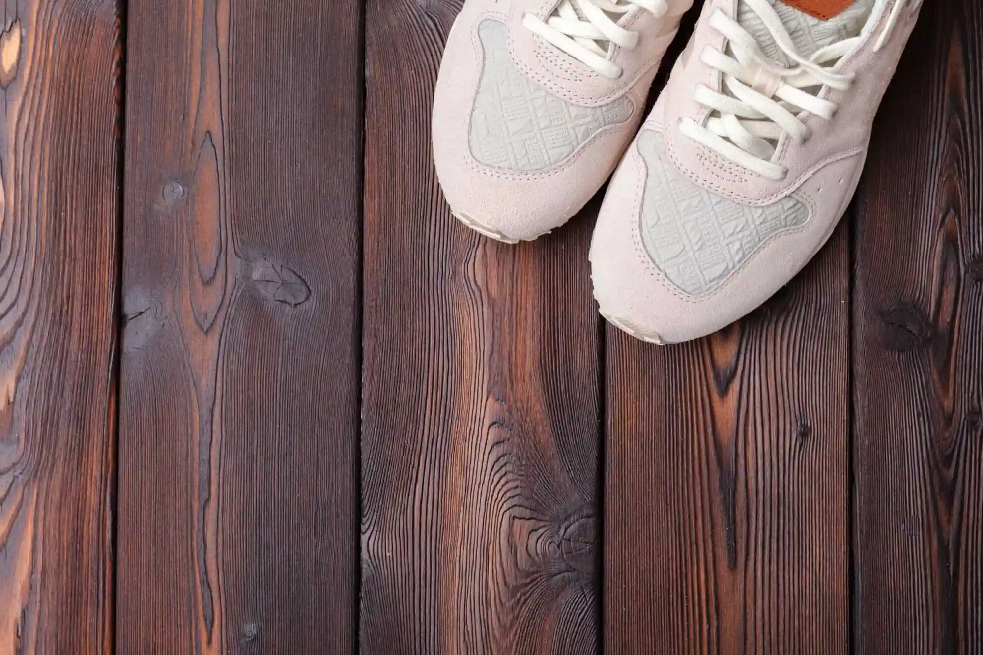 sneakers on old wooden hardwood