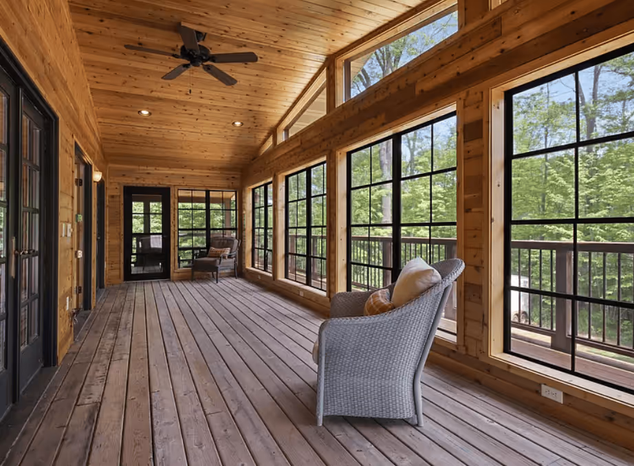 large windows with hardwood floors porch