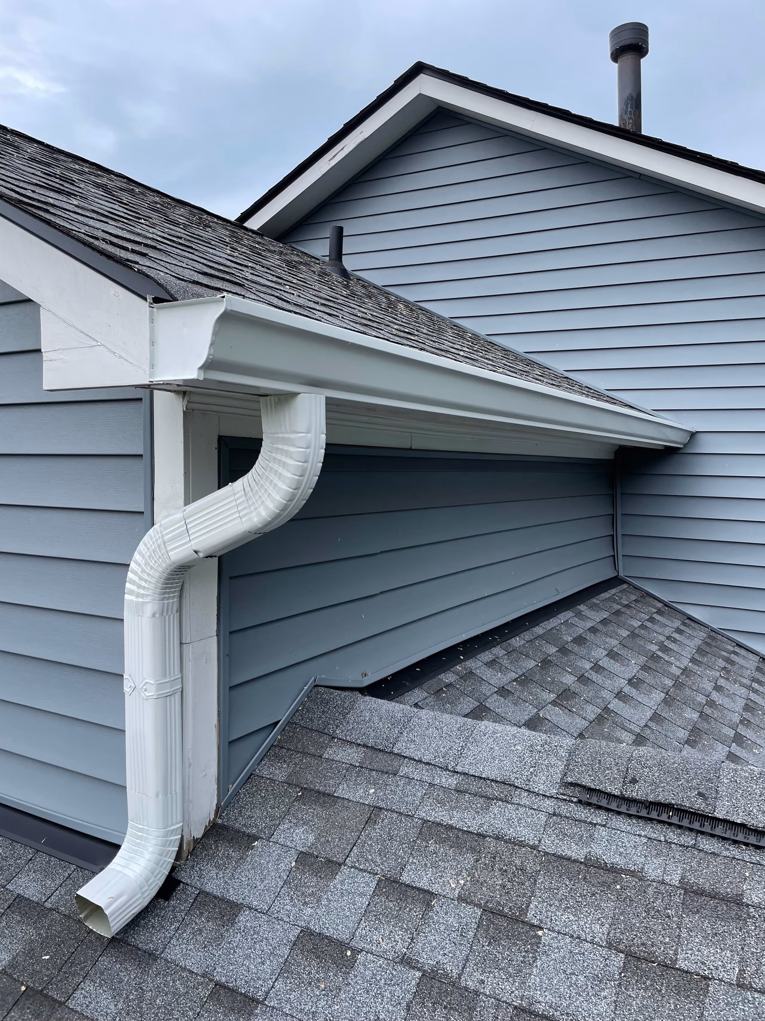 top gutters of blue house