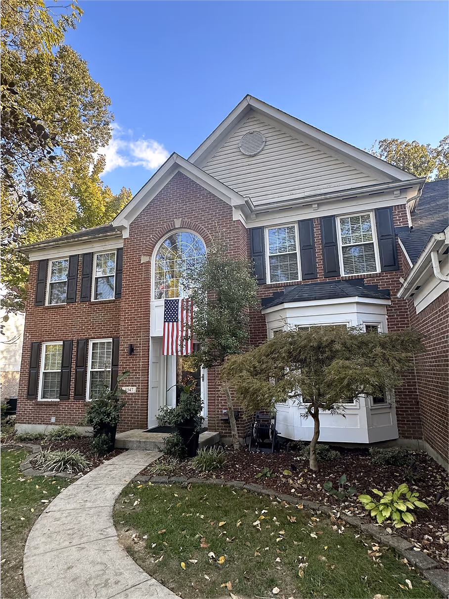 front of brick house
