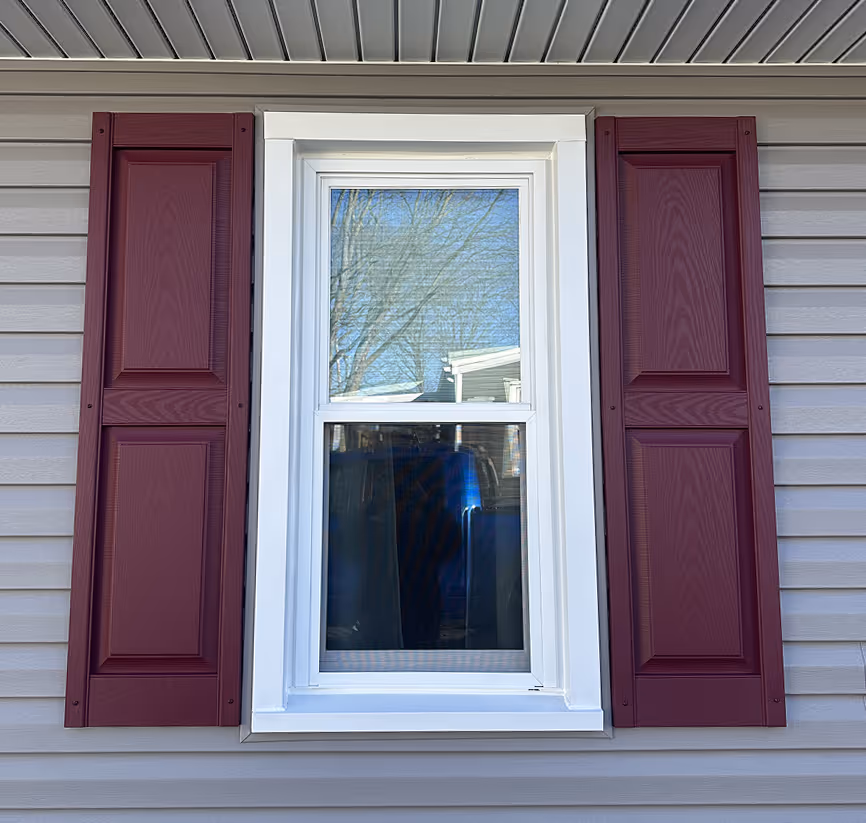 window with red window guards