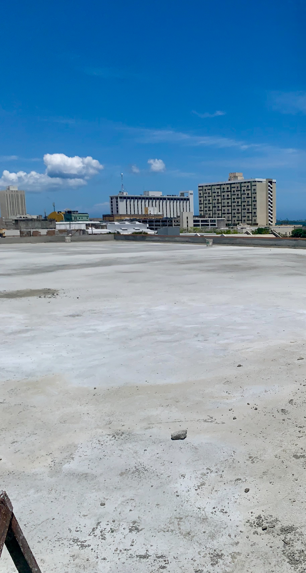 Newly finished concrete flat roof on a commercial building in Kingston, Jamaica.