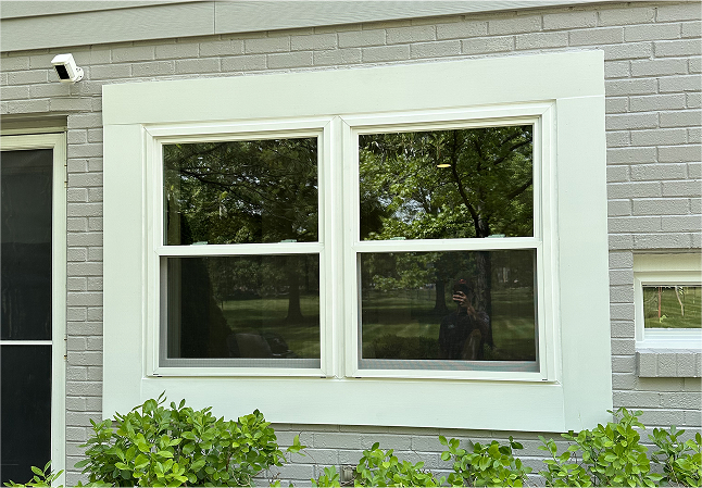 Energy-efficient window and door installation on a home exterior