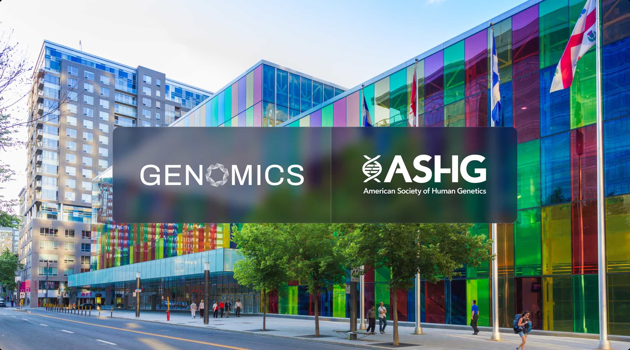 Genomics and American Society of Human Genetics (ASHG) logos over the Palais des congrès de Montréal in Montreal