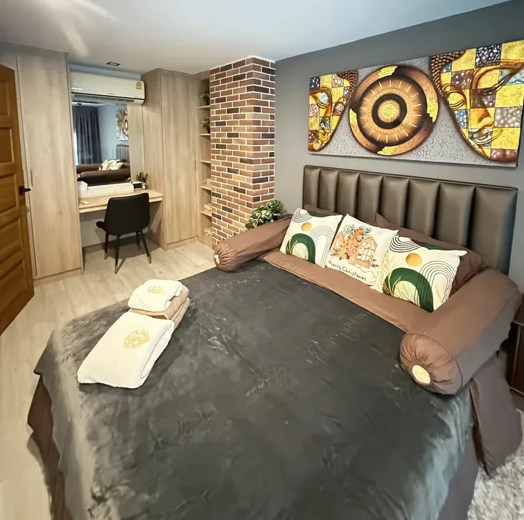Bedroom with full-width headboard and mirror — Utopia Nai Harn, Nai Harn