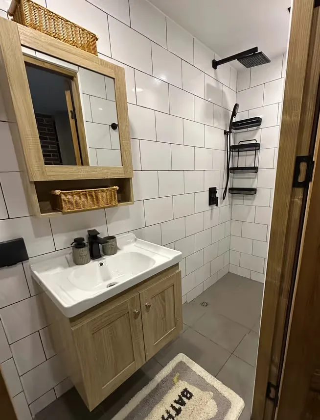 Bathroom with shower and timber vanity — Utopia Nai Harn, Nai Harn
