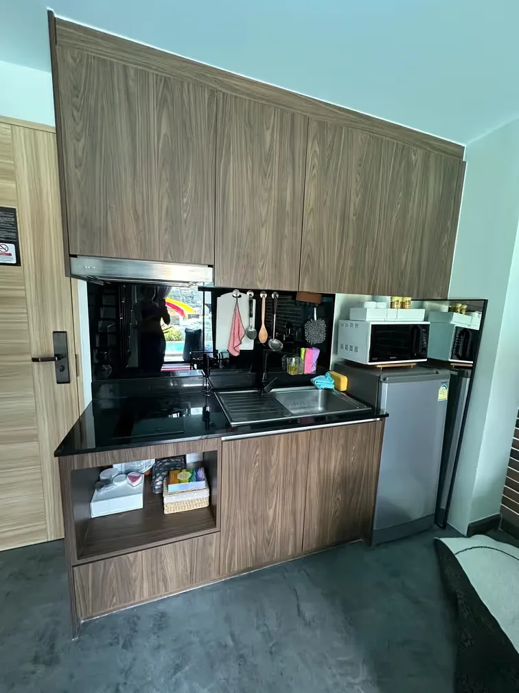 Kitchen with built-in appliances and sink — Utopia Nai Harn, Nai Harn