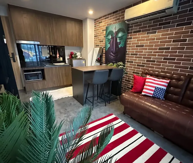 Breakfast bar with TV and kitchen — Utopia Nai Harn, Nai Harn