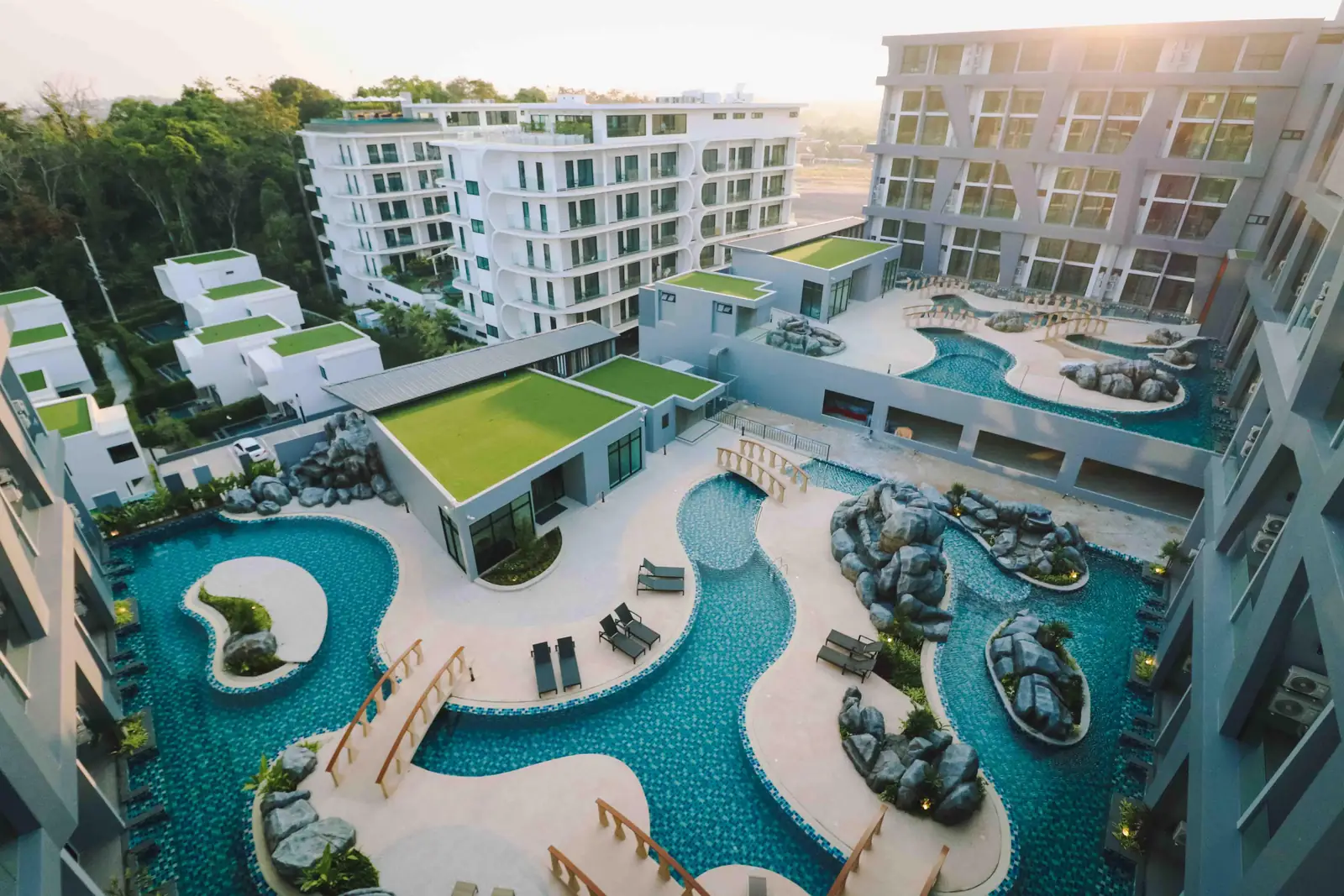 Lagoon pool between the buildings from above — Utopia Nai Harn, Nai Harn