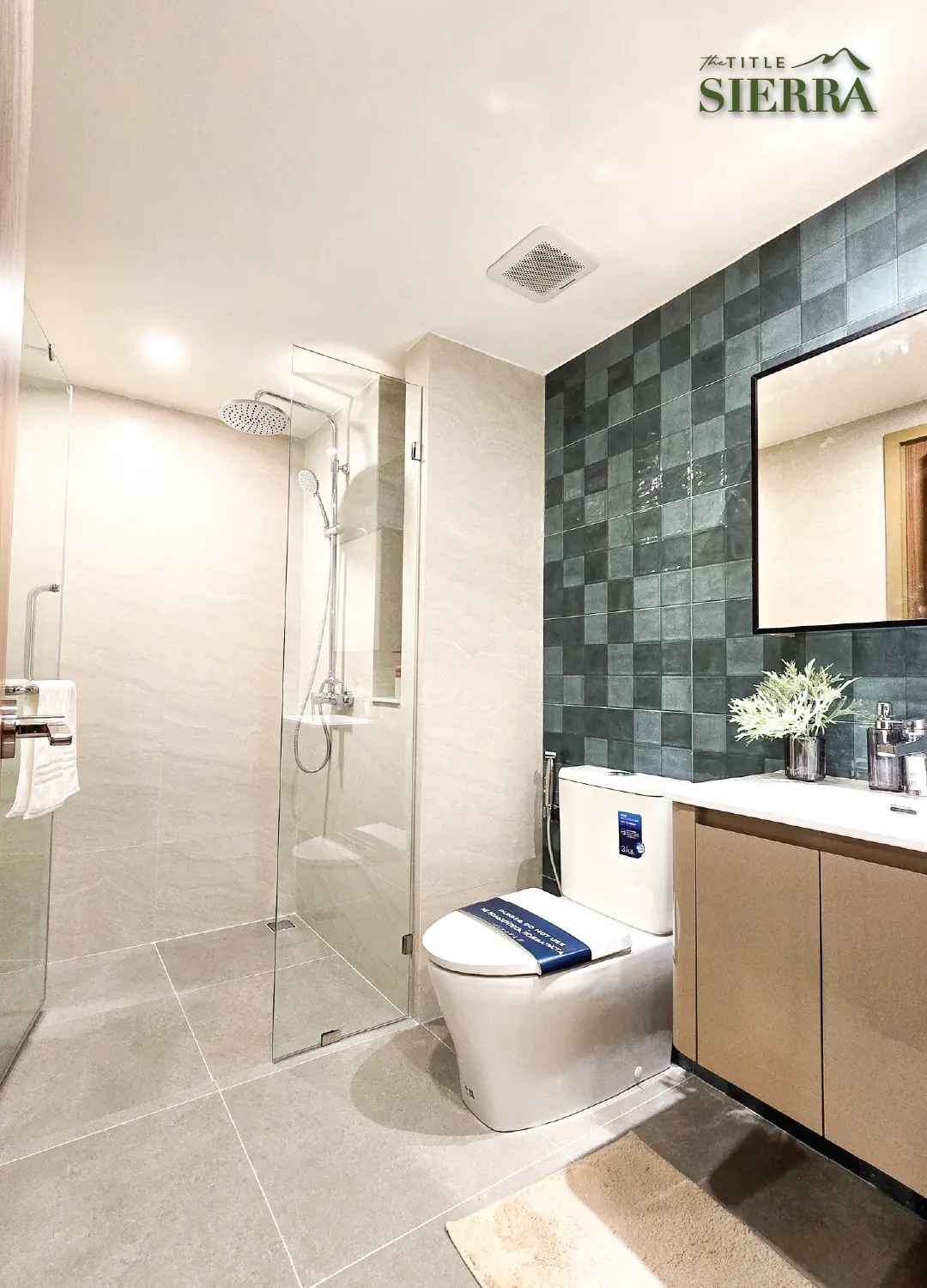 Bathroom with walk-in shower behind glass and green tiling — The Title Sierra, Bang Tao