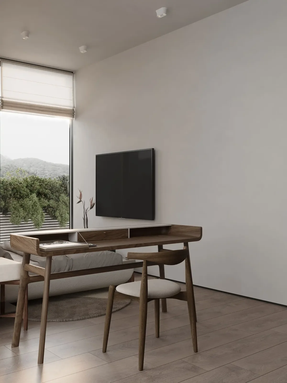 Desk by the full-height window with TV — Sunny Moon Phuket, Nai Harn