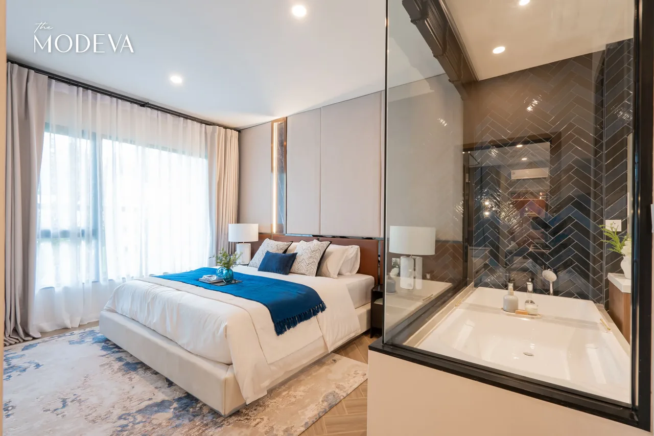 Bedroom with bathtub behind a glass partition — The Title Modeva, Bang Tao