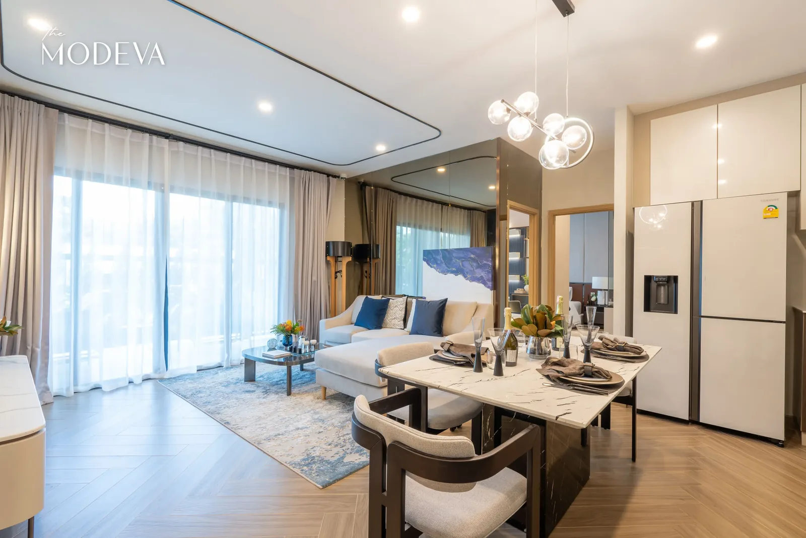 Living and dining area with fridge and balcony — The Title Modeva, Bang Tao