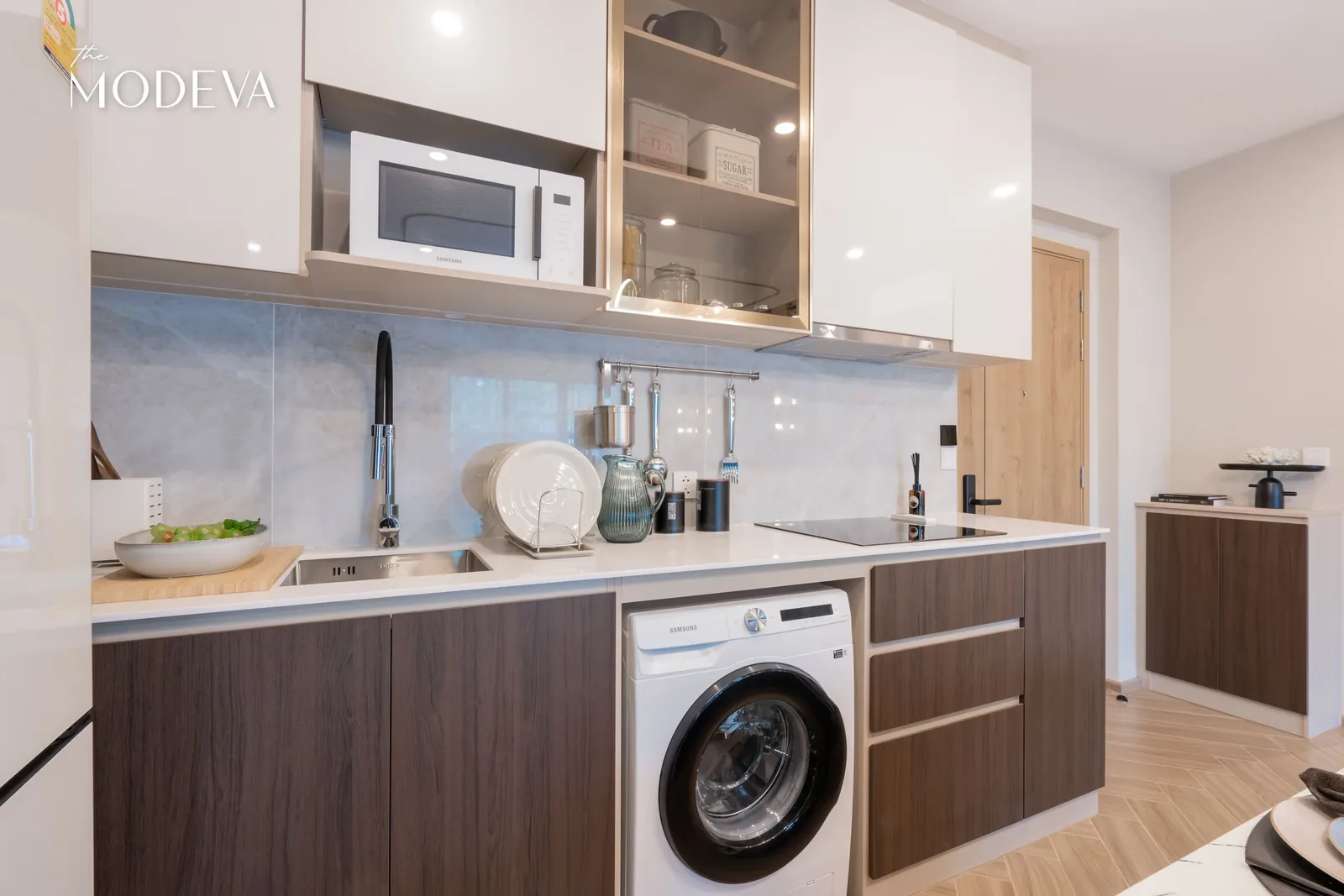 Kitchen with washing machine and microwave — The Title Modeva, Bang Tao