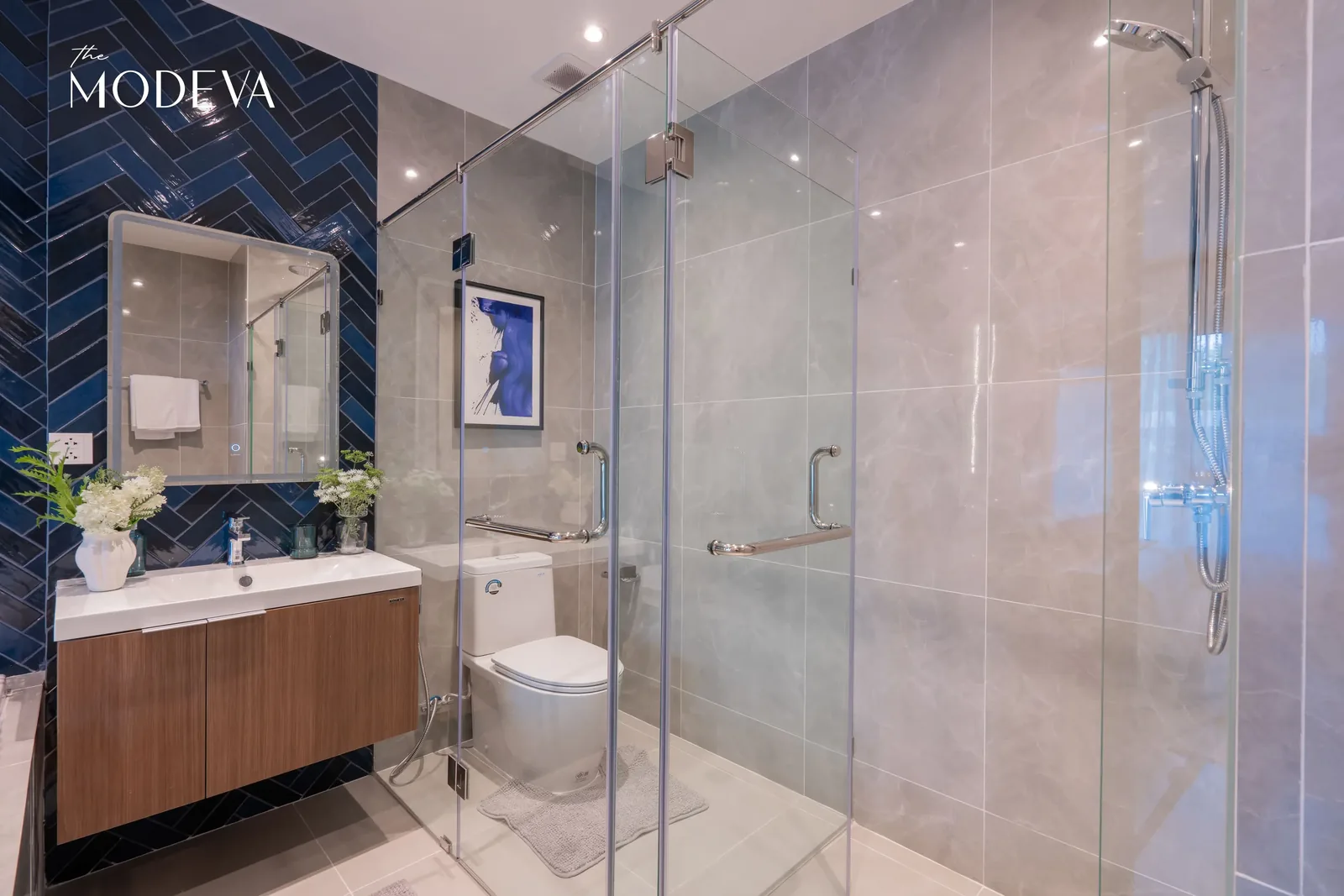 Bathroom with blue herringbone tiling and shower — The Title Modeva, Bang Tao