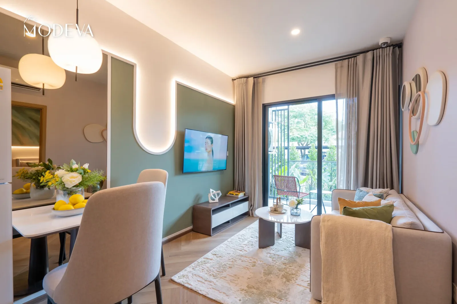 Living room with dining area and wall artwork — The Title Modeva, Bang Tao