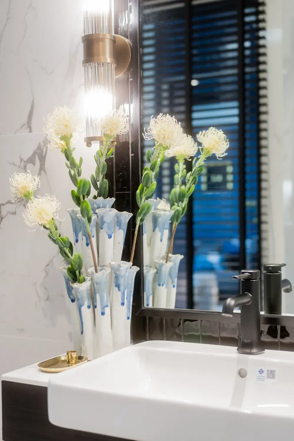 Washbasin with mirror and wall light — The Title Heritage, Bang Tao
