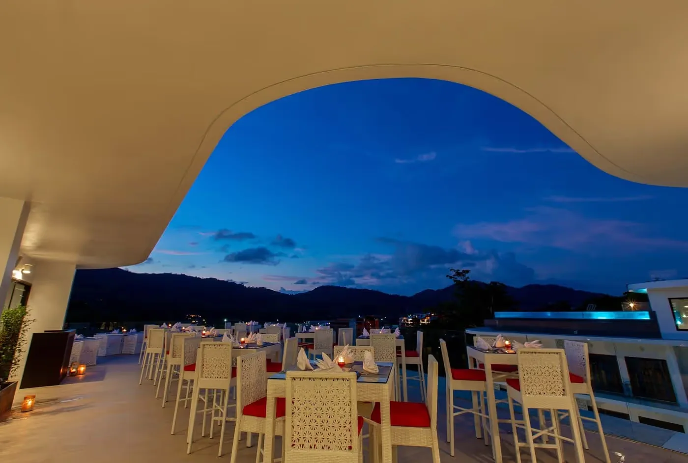 Rooftop restaurant at blue hour — Utopia Nai Harn, Nai Harn