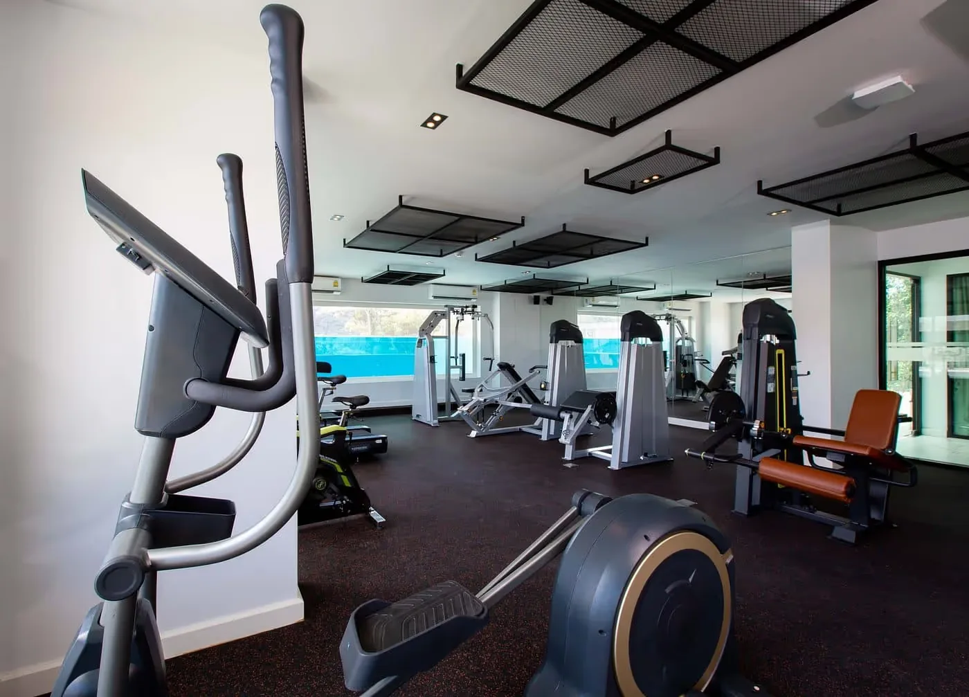 Gym overlooking the pool — Utopia Nai Harn, Nai Harn