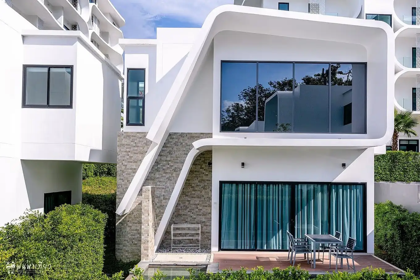 Villa facade with full-height glazing — Utopia Nai Harn, Nai Harn