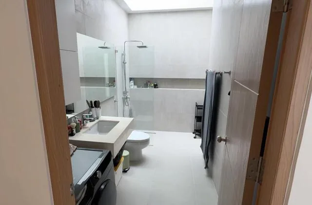 Bathroom with walk-in shower behind glass — Ban Bua, Nai Harn