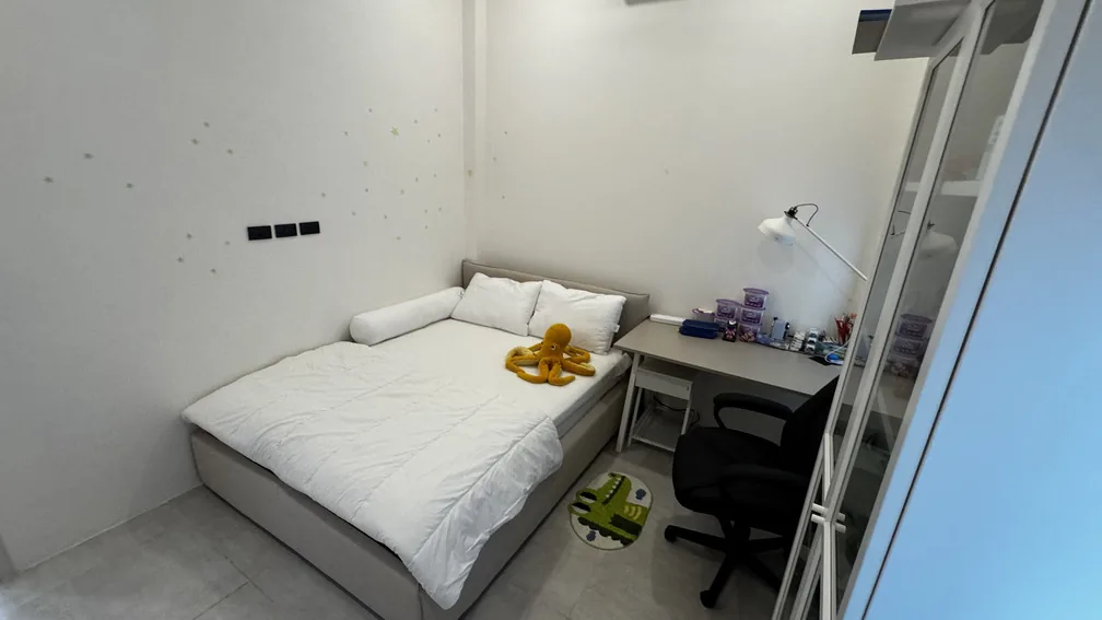 Bedroom with bed and desk by the window — Ban Bua, Nai Harn