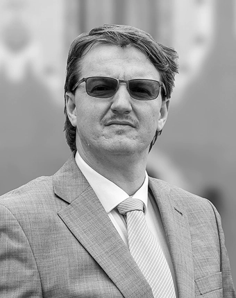 Ph.D., LL.M., Dr. Kádár Hunor