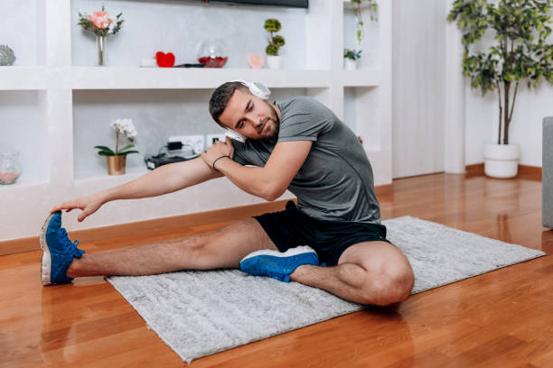 Male athlete following structured fitness routines for men at home