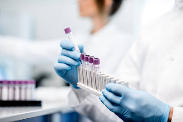 Lab technician preparing samples for men’s integrative health testing