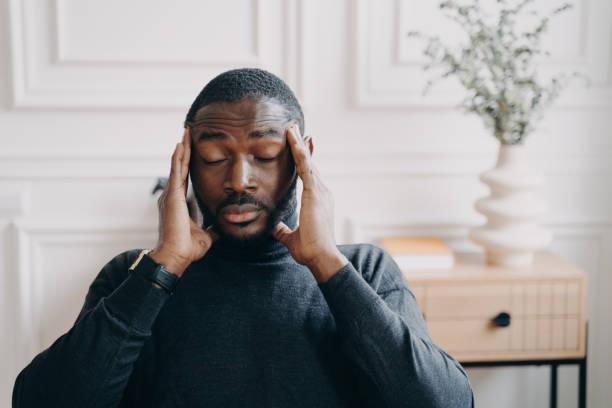 Man practicing stress reduction techniques recommended in functional medicine programs